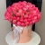 Композиция в шляпной коробке из 113 пионов Корал Шарм в Воскресенске
